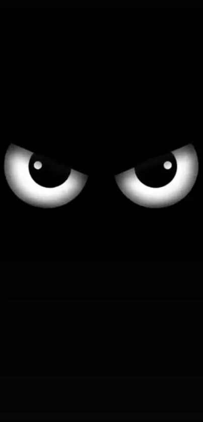 Mysterious black wallpaper with intense eyes design.