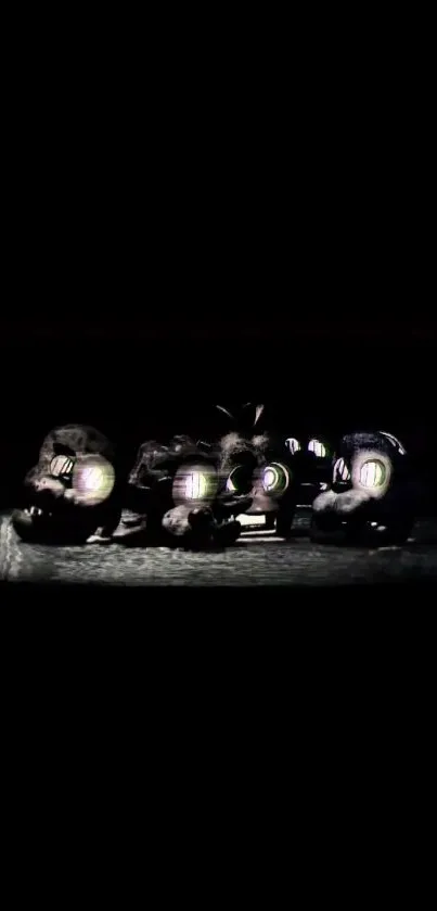 Dark futuristic vehicles illuminated against a black background, perfect for mobile.