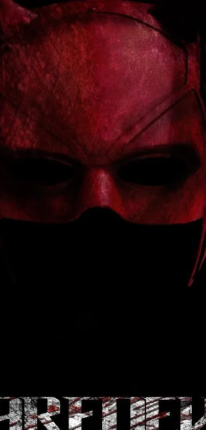 Dark red hero mask on black background wallpaper.