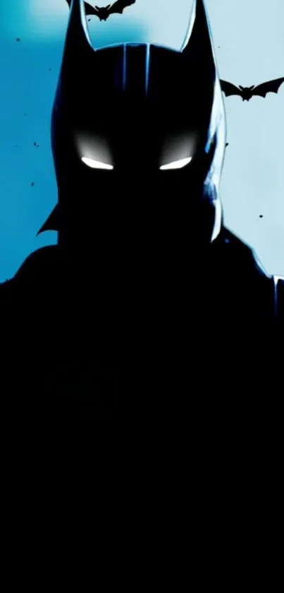 Dark silhouette of a hero with glowing eyes and bats on a blue-black background.