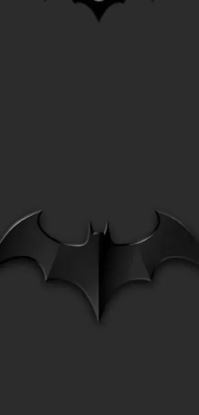 Dark bat symbol on a gray background wallpaper.