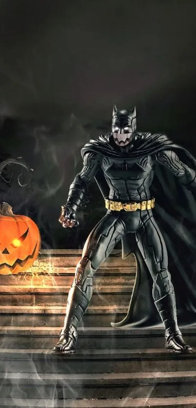 Batman stands amid Halloween decorations with pumpkins and mist.