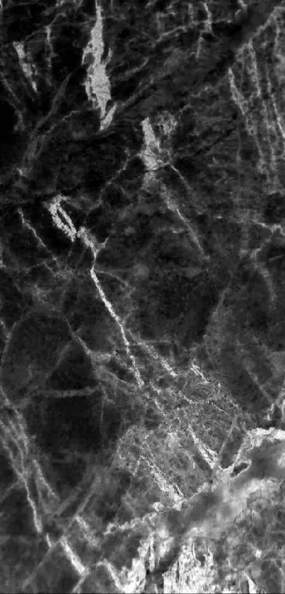 Dark marble texture mobile wallpaper with intricate patterns.