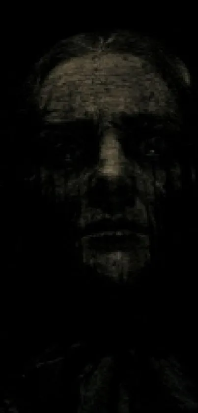 Dark and mysterious face on black background wallpaper.