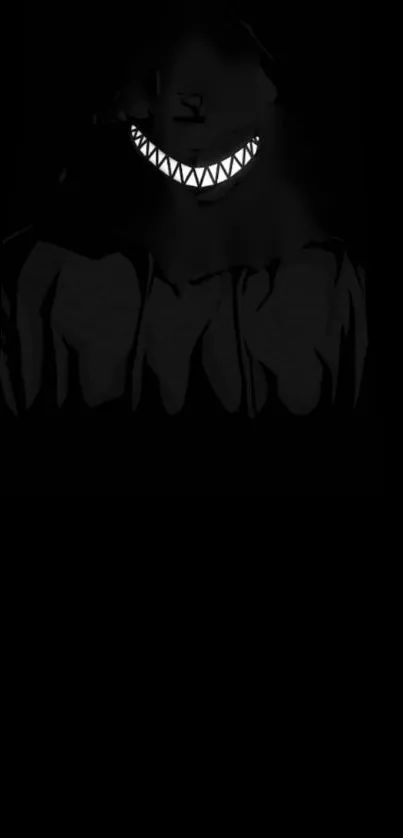 Dark cloaked figure with sinister grin on black background wallpaper.