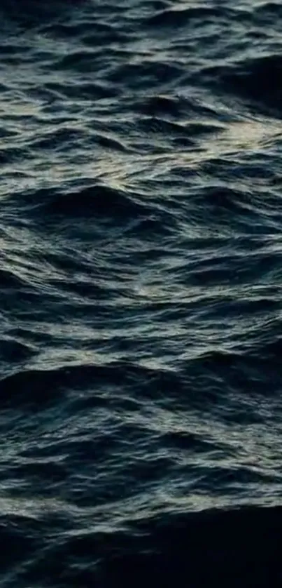 Dark ocean waves mobile wallpaper for a serene background.