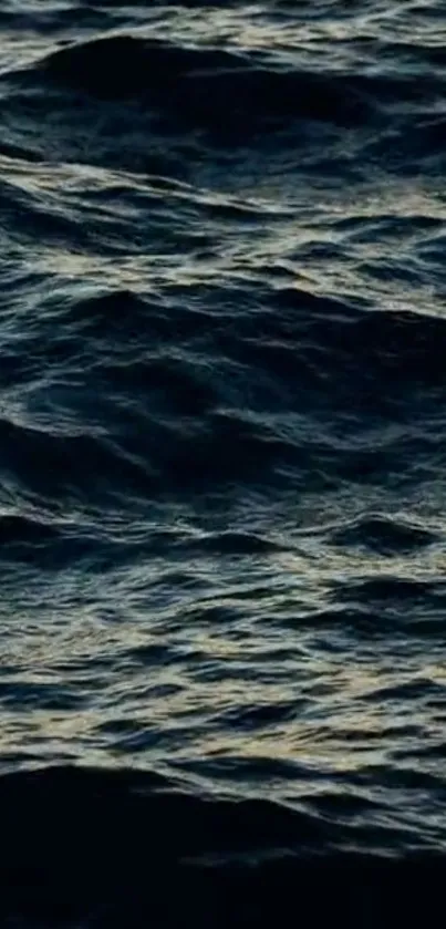 Dark ocean waves create a calming phone wallpaper.