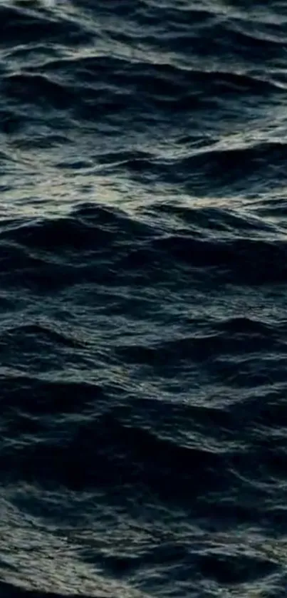 Dark ocean waves create a calming phone wallpaper.