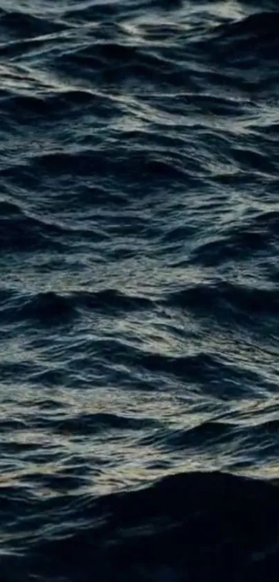 Dark ocean waves creating a serene and calming effect.