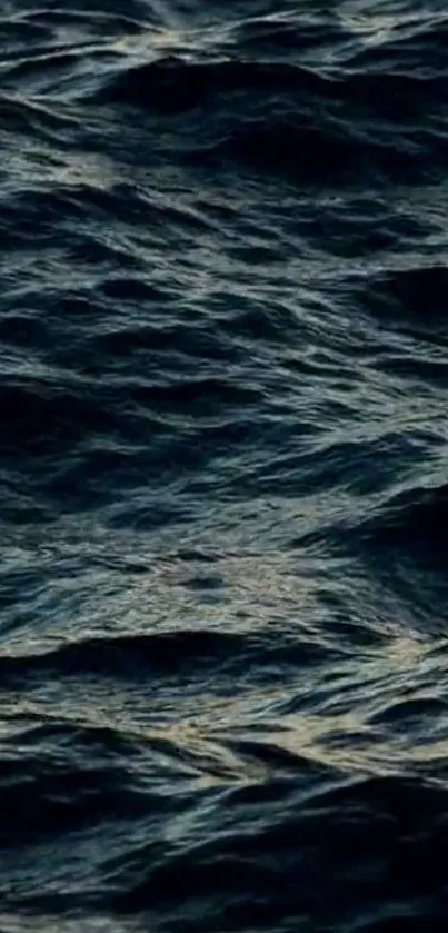 Dark ocean waves create a serene and calming mobile wallpaper aesthetic.