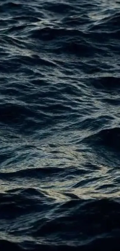 Dark ocean waves form calming mobile wallpaper background.