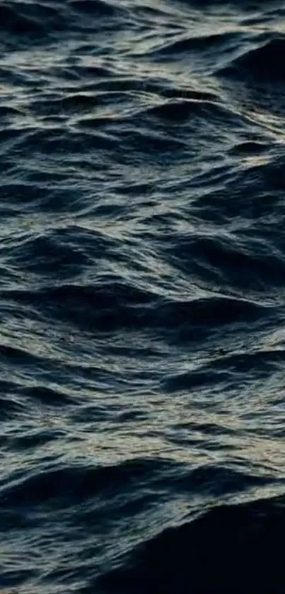 Mobile wallpaper featuring dark ocean waves creating a serene atmosphere.