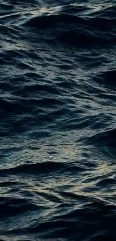 Dark ocean waves creating a serene background.