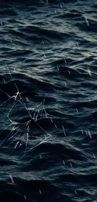 Dark ocean with cobweb and rain on mobile wallpaper.