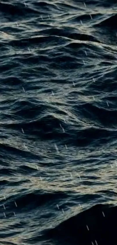 Dark ocean waves with rain falling gently, ideal for wallpaper.