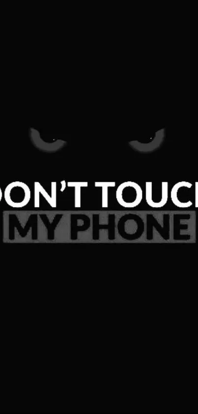 Dark "Don't Touch My Phone" wallpaper with bold white text on a black background.