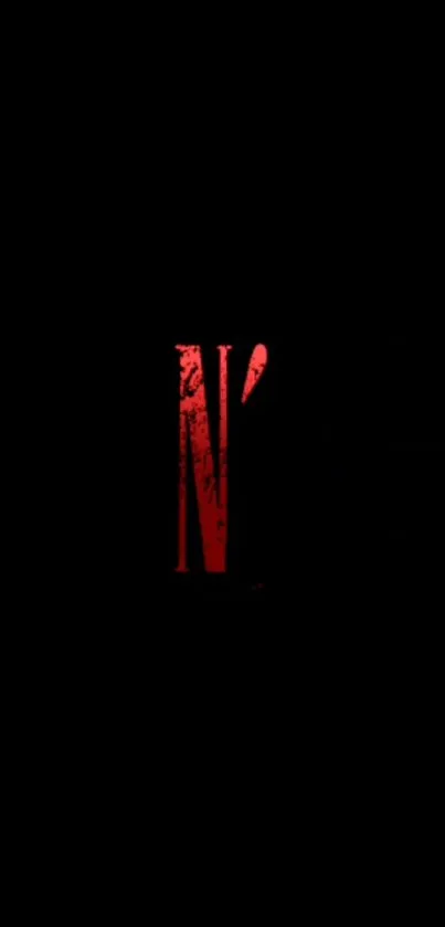 Dark wallpaper with a bold red letter N in the center.