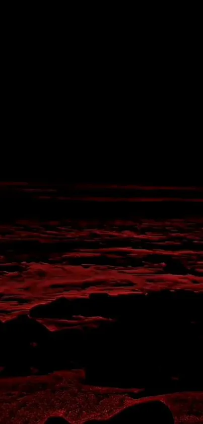 Dark red ocean waves under a night sky.