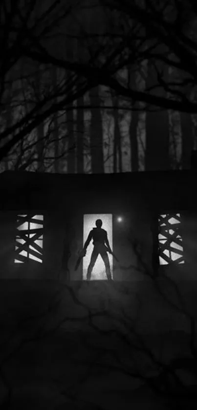 Dark figure in forest with eerie cabin, black and white mobile wallpaper.