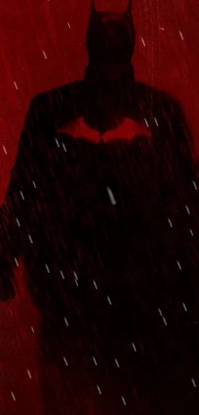 Silhouette of dark superhero on red background wallpaper.