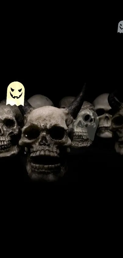 Dark collection of skulls on black background, gothic theme.