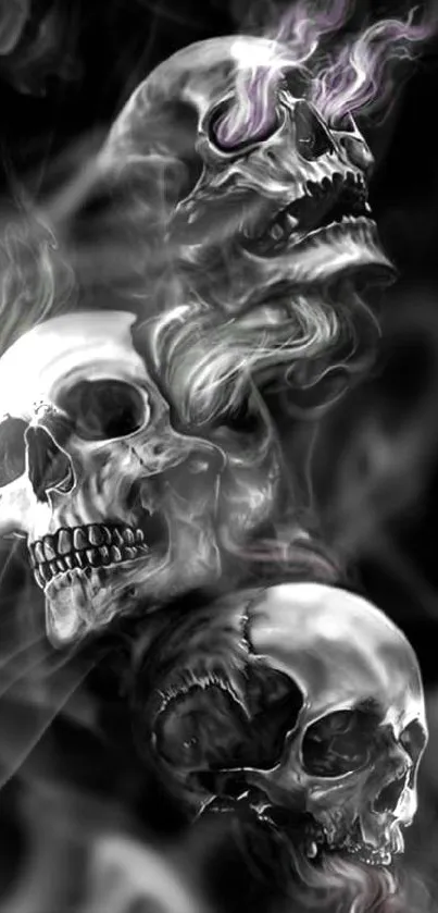 Dark skulls emerging from smoke on a black background.