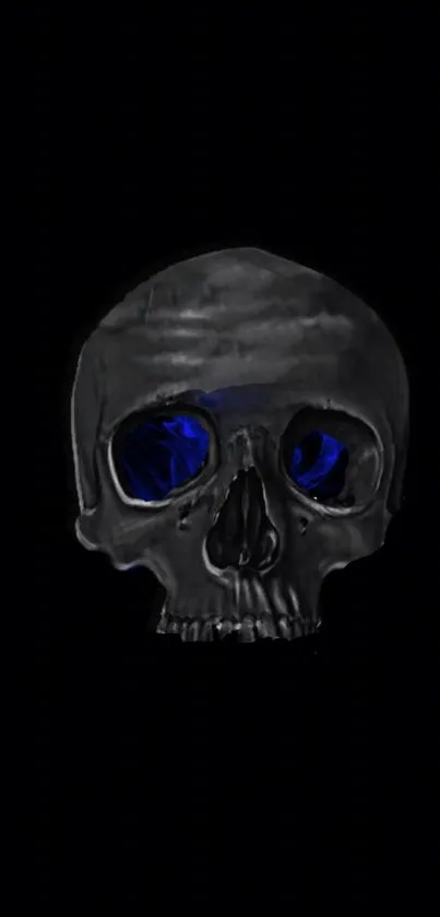 A dark skull with glowing blue eyes on a black background.