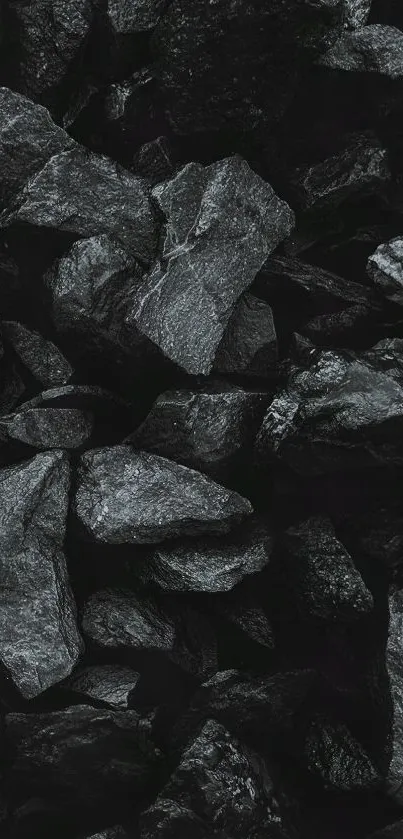 Dark stone texture wallpaper with black rocks.