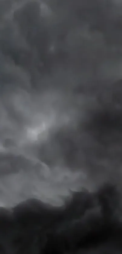 Dark, stormy sky with swirling clouds.