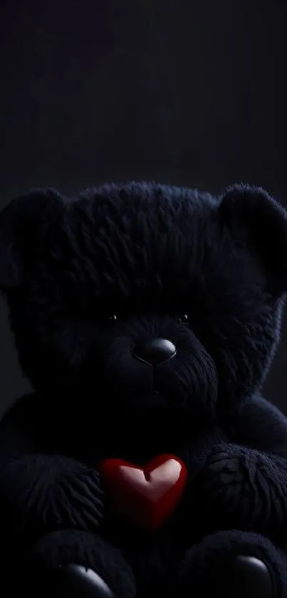 Dark teddy bear holding a red heart on black background wallpaper.