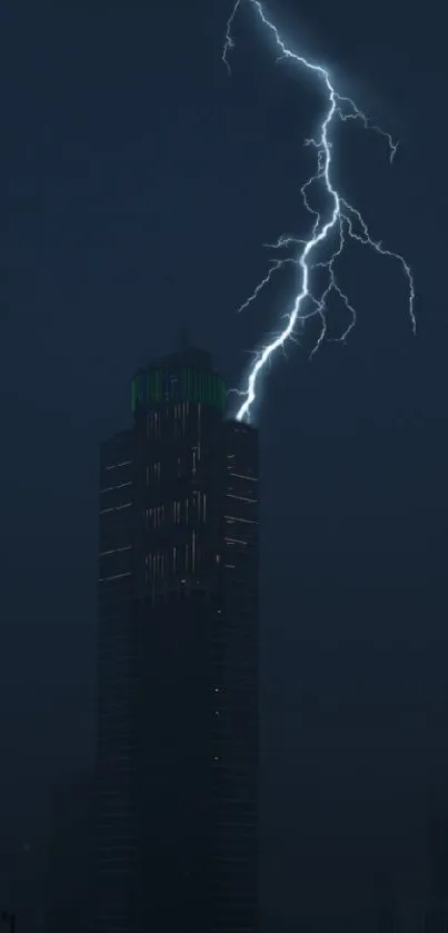 Lightning striking a dark skyscraper at night.