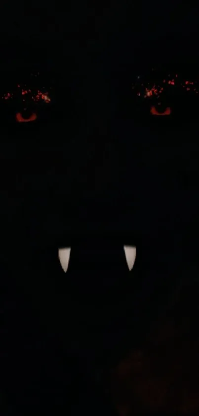 Dark-themed wallpaper with vampire eyes and fangs.