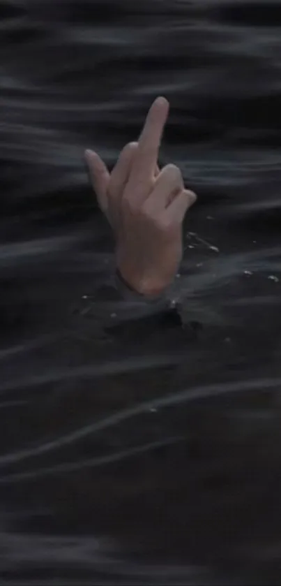 Hand making gesture in dark water wallpaper.