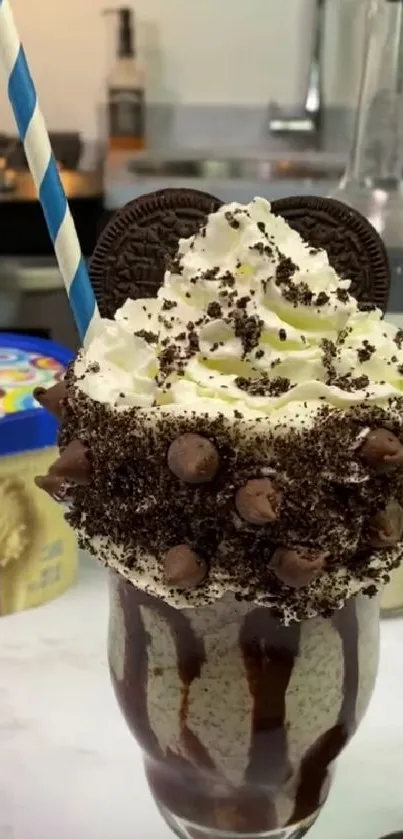 Oreo milkshake with whipped cream and chocolate toppings.