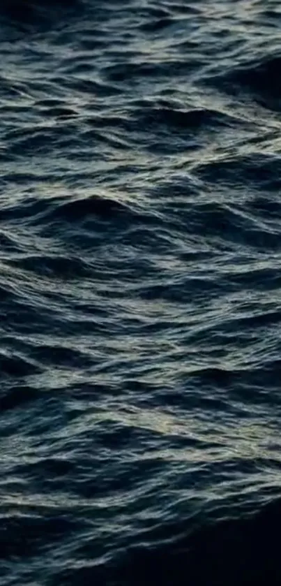Dark ocean waves creating a calming mobile wallpaper.