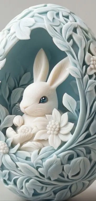 Intricate bunny carved inside floral egg.