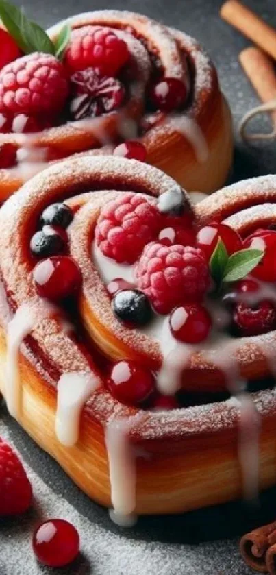 Heart-shaped pastries with berries and icing