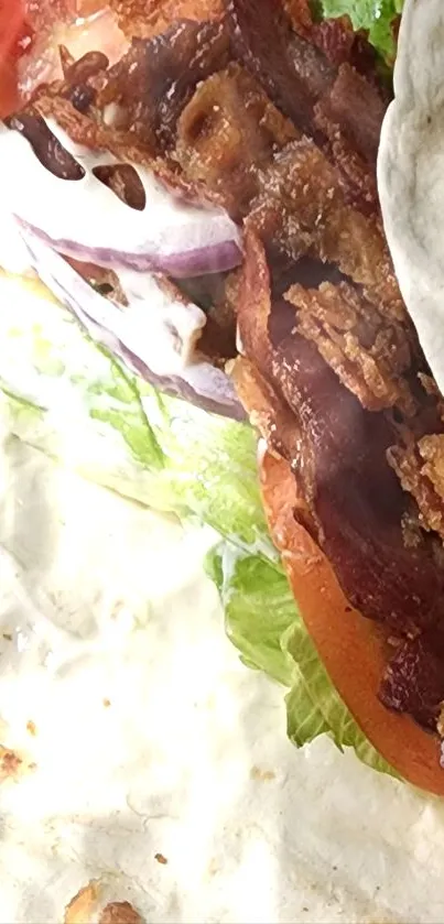 Close-up of a delectable BLT wrap with bacon, lettuce, and tomato.