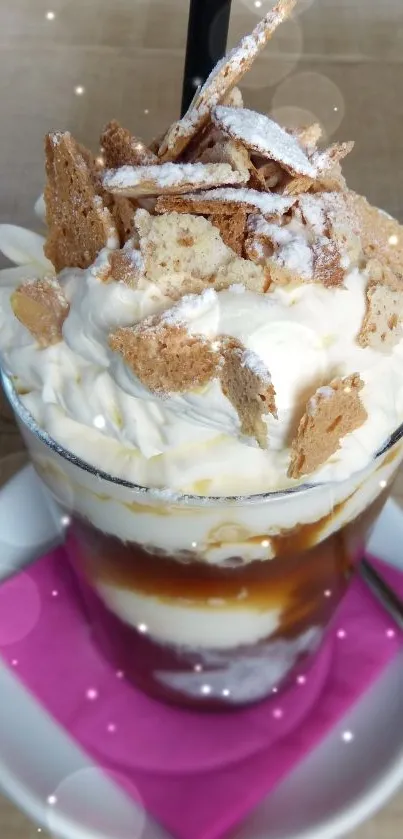A tempting dessert with whipped cream and caramel in a clear glass.