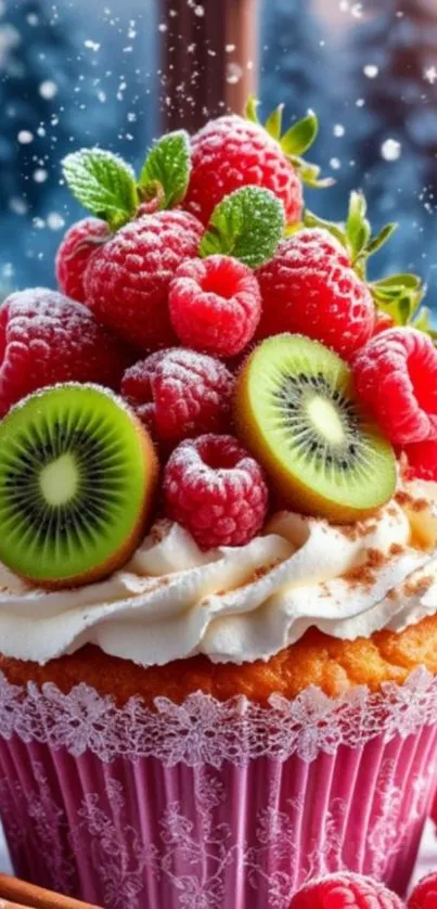 Cupcake with raspberries and kiwi decorated with whipped cream.