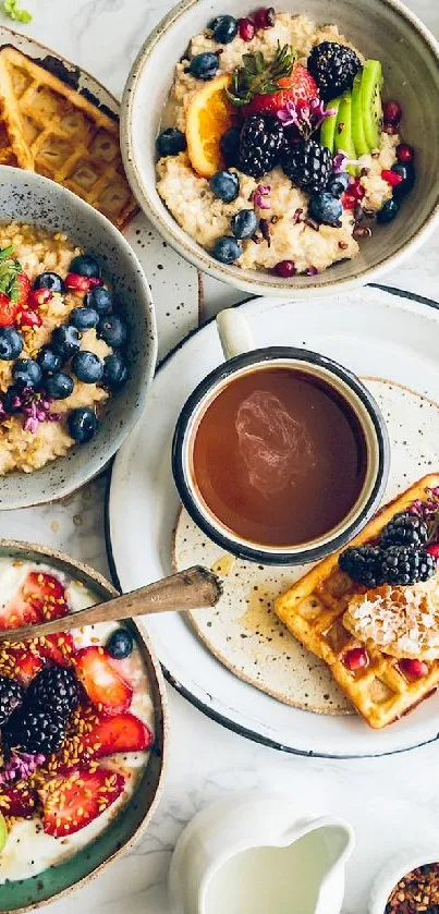 Gourmet breakfast spread with waffles and fruit on a light grey background.