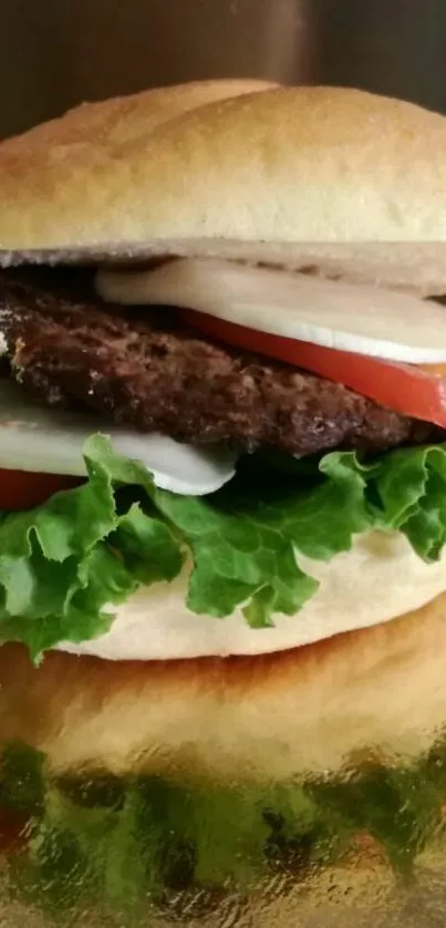 Gourmet burger with lettuce, tomato, and mozzarella on golden surface.