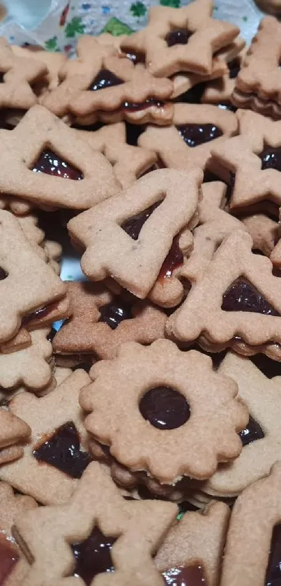 Assortment of homemade star-shaped cookies with jam filling.