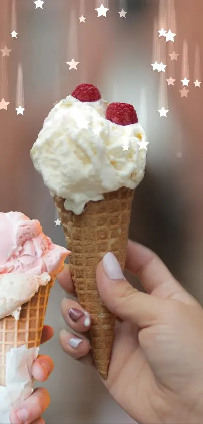 Two hands hold vanilla and strawberry ice cream cones with stars.