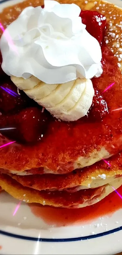 Pancakes with strawberries and cream on a plate.