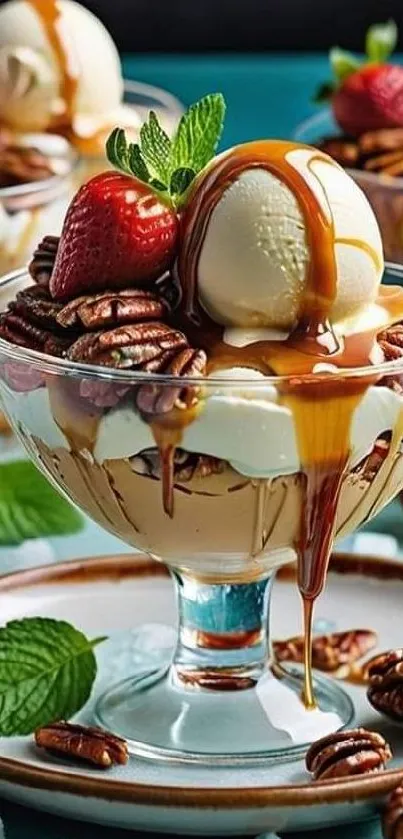 Ice cream dessert with strawberries, pecans, and caramel on a turquoise background.