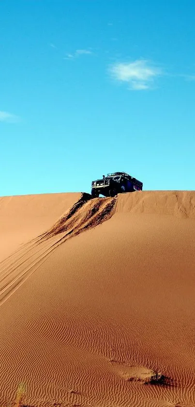 4x4 vehicle on sand dunes under clear blue sky.