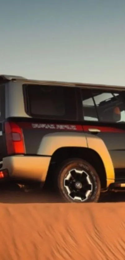 SUV driving through desert sand dunes with sunset backdrop.