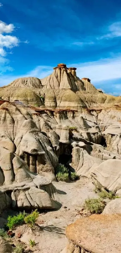 Desert rock formations under a vivid blue sky.