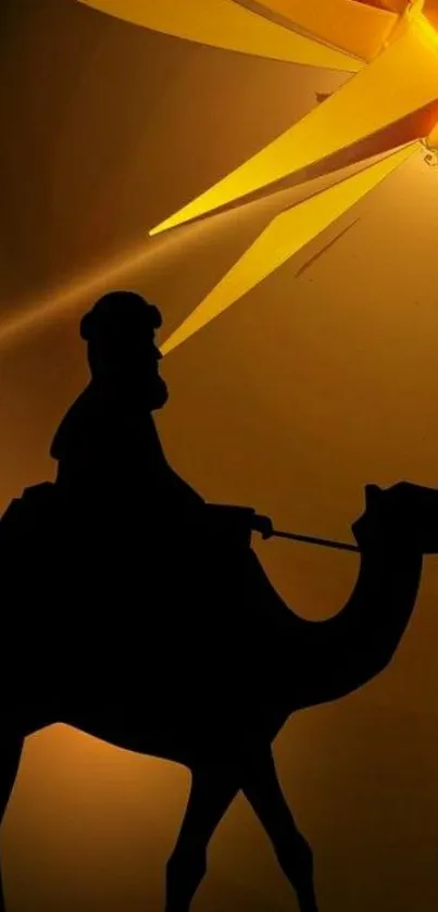 Silhouette of camel and rider under a glowing star.